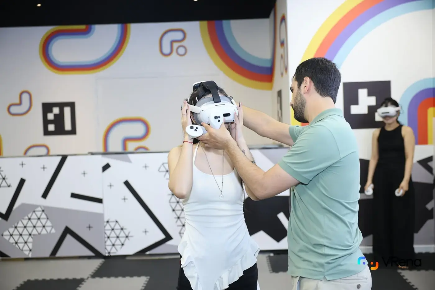 A game master fits a headset
