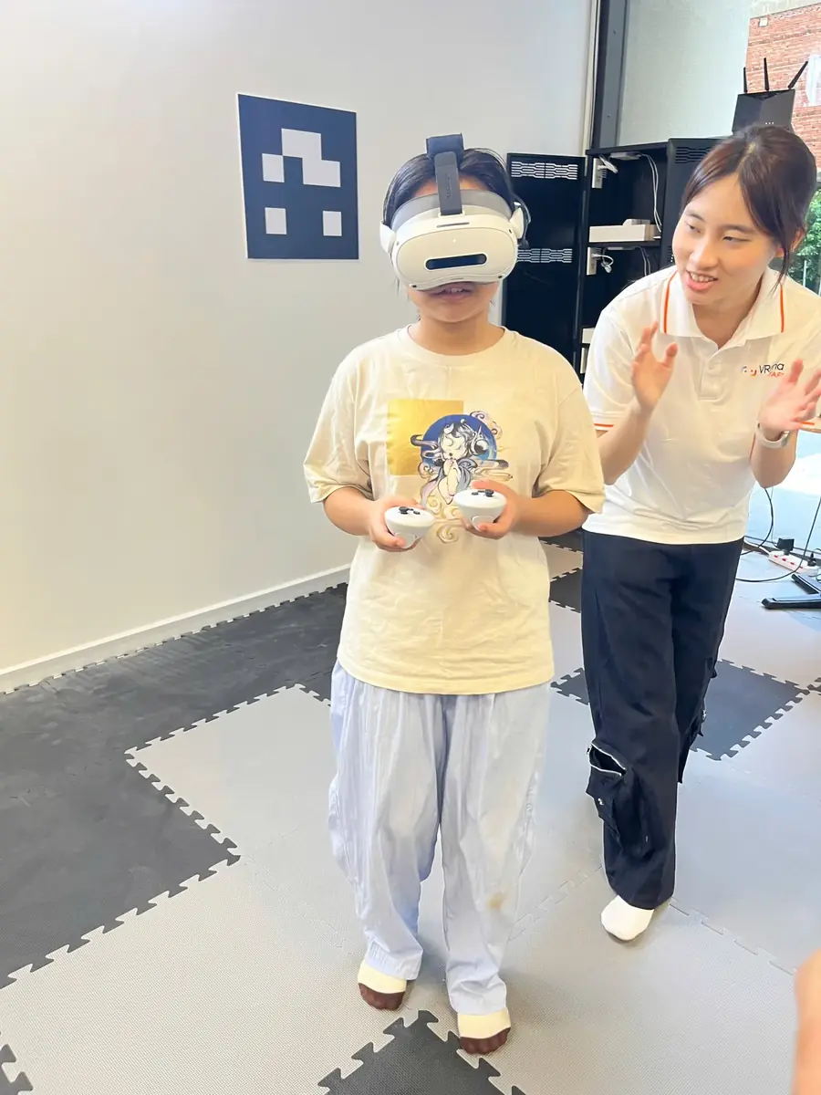 A game master guides a young player